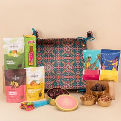 Impressive Gift Hamper of Organic Gulal with Nutty Mix Sweets N Assortments