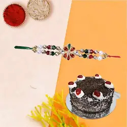 A charming Black Forest cake,Rakhi, with free Roli Tika and Chawal