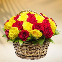 Blossoming Charm of Red N Yellow Roses in a Basket