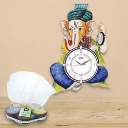 Marvelous Ganesha Wooden Wall Clock N Iris Aroma Candle to Nagpur