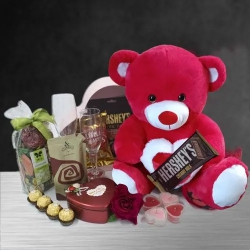 Dazzling Candle Lit Romantic Evening Hamper with Teddy n Imported Chocolates