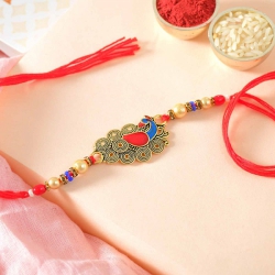 Goodness Prevails with Peacock Rakhi to Rakhi-to-canada.asp