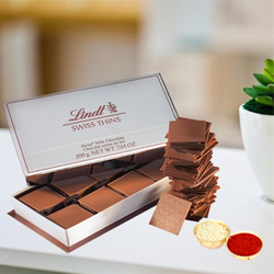 Lindt Swiss Thins with free Roli Tilak and Chawal.