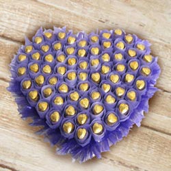 Yummy Heart Shaped Arrangement of Homemade Chocolates to Punalur