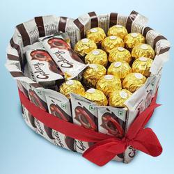Awesome Heart Shape Arrangement of Ferrero Rocher and Galaxy Chocolates to India