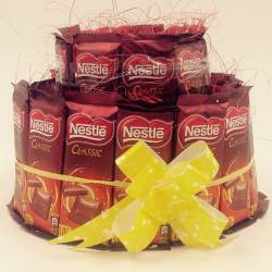 Magical Dual Layer Arrangement of Nestle Classic Chocolates to Hariyana