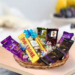 Yummy Assorted Chocos Gifts Basket to Alwaye