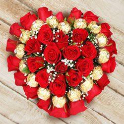 Delightful Heart Shaped Arrangement of Roses N Ferrero Rocher Chocolate to Rajamundri