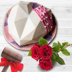 Sumptuous White Heart Pinata Cake with Hammer n Red Roses