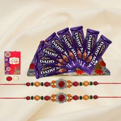 Smile Sensation with Cadbury Dairy Milk Chocolates Collection with 2 Designer Rakhi and Roli Tilak Chawal