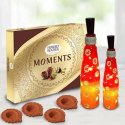Exclusive Diwali Gift of Ferrero Rocher Chocolates n Twin Bottle Art Lamp n Diya to India