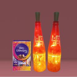 Amazing Diwali Gift of Subh Labh LED Bottle Lamp Pair n Cadbury Celebration to India