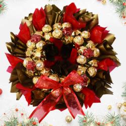 Terrific Merry Christmas Wreath of Handmade Chocolates to Tirur