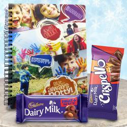 Lovely Personalized Gift of Presto Note Book n Cadbury Chocolates to Punalur