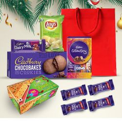 Appealing Christmas Chocolate N Snacks in a Bag to Tirur