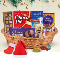 Assorted Chocolates n Christmas Accessories Basket to Tirur