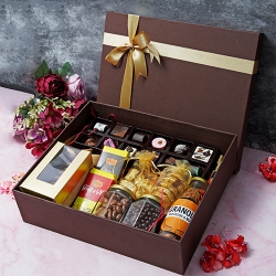 Classically Arranged Mothers Day Crunchy N Sweet Treat Box to India