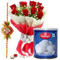 1 Kg. Rasgulla and 12 Red Roses with Free Rakhi, Roli Tika, Chawal to Tirur
