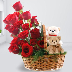 Beautiful Arrangement of Red Roses with Twin Teddy to India