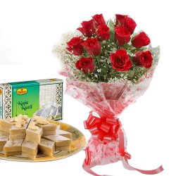Charming 1 dozen Red Roses along with appetizing Kaju Katli to Rajamundri