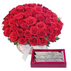 Astonishing 50 Red Roses along with delicious Kaju Barfi