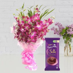 Combo of Cadbury Dairy Milk Silk and Orchids Bouquet to India