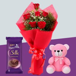 Delightful Red Roses Bouquet with Teddy N Cadbury Dairy Milk Silk to Sivaganga
