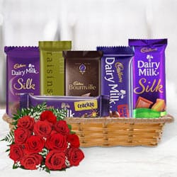 Amazing Gift Hamper of Cadbury Chocolates with Red Roses Bouquet to Uthagamandalam