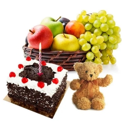 Exclusive Teddy with Candles, Fresh Fruits Basket and Black Forest Cake to Rajamundri
