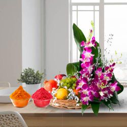 Mouth-watering assorted Fruit basket with charming Flowers