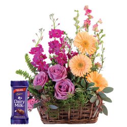Splendid colorful Flowers along with luscious Cadburys Chocolate to Karunagapally
