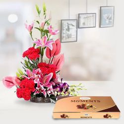 Attractive Arrangement of Exotic Flowers with Ferrero Rocher Moment to Punalur