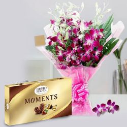 Splendid Bouquet of Orchids N Ferrero Rocher Chocolate Box to Karunagapally