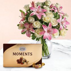 Delicate Lilies n Roses in Glass Vase with Ferrero Rocher Moments