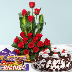 18 Dutch Red Roses Bouquet with 1 Lbs. Black Forest Cake and 1 Cadbury's Celebration