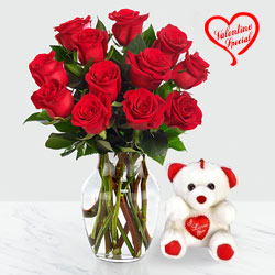 12 Dutch Red Roses in Vase with a Cute Teddy Bear 