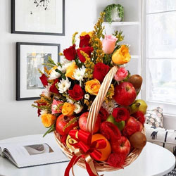 Remarkable Fruits n Mixed Flowers Gift Basket to Rajamundri