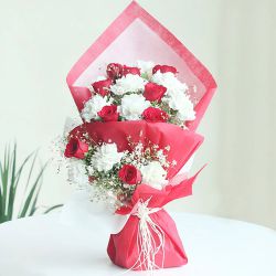 Splendid Roses n Carnations Bouquet in Tissue Wrap