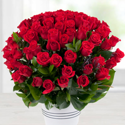 Classy arrangement of  100 Dutch Roses 