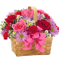 Exquisite colourful mixed Flowers in a basket to India