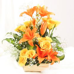 Striking Arrangement of Orange Lily with Yellow Roses