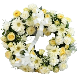 Pristine Assorted White N Yellow Flowers Wreath to Punalur