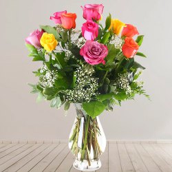 Touching Bouquet of Mixed Roses in a Glass Vase