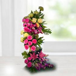Distinctive Standing Arrangement of Assorted Flowers to Tirur
