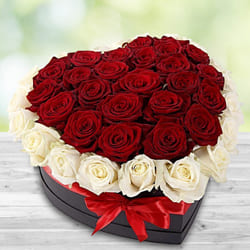 Fabulous Heart Shaped Box of Red and White Roses to Rajamundri