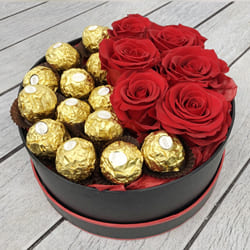 Amusing Ferrero Rocher n Red Roses Hat Box to Rajamundri