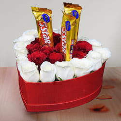 Beautiful Composition of Roses N Chocolates in Heart Box to Punalur
