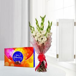 Captivating Gladiolus Bouquet with Cadbury Celebration Pack to Rajamundri