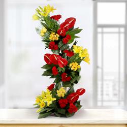Magnificent Tall Arrangement of Fresh Flowers to Alwaye