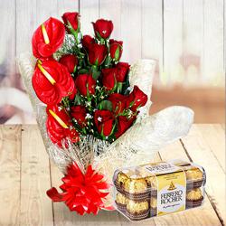 Striking Combo of Red Flowers Bouquet with Ferrero Rocher to Rajamundri